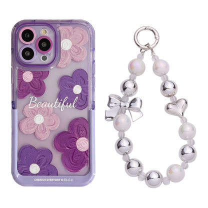 Fialové květiny na ochranném krytu iPhone s stojánkem