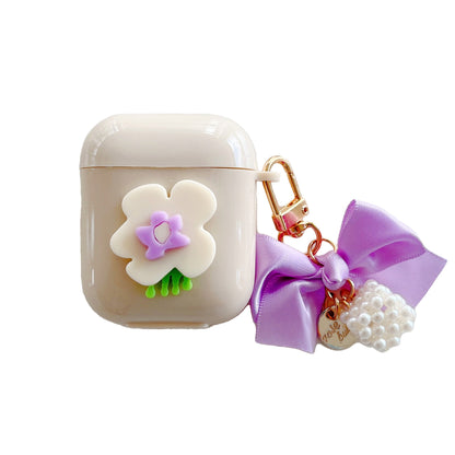 Fialový kryt na AirPods s mašlí